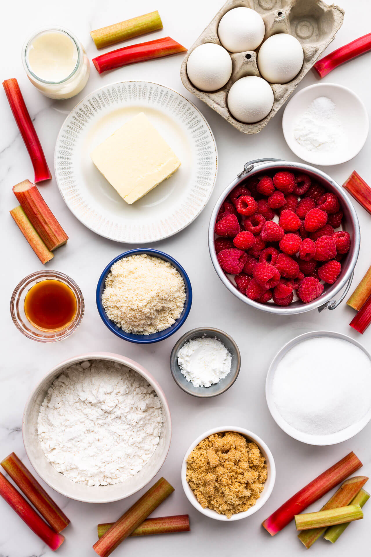 Ingredients for rhubarb upside down cake with raspberries