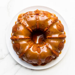 Bundt cake coated with shiny salted caramel sauce